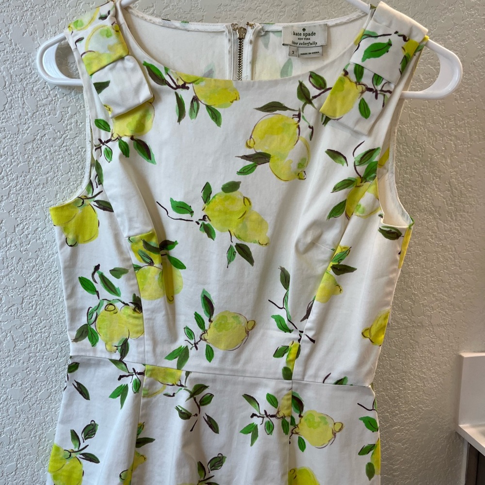 Kate Spade lemon peplum top